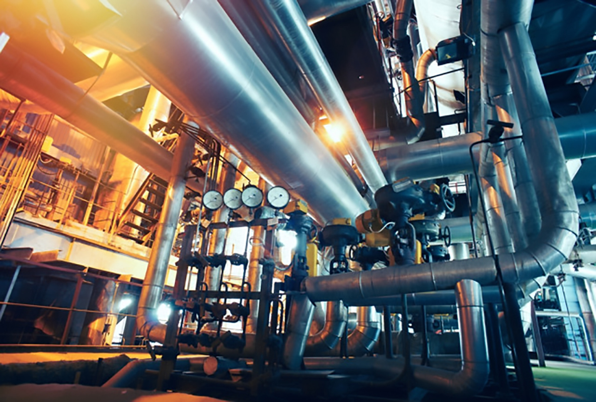 In a factory with pressure gauges and pipes