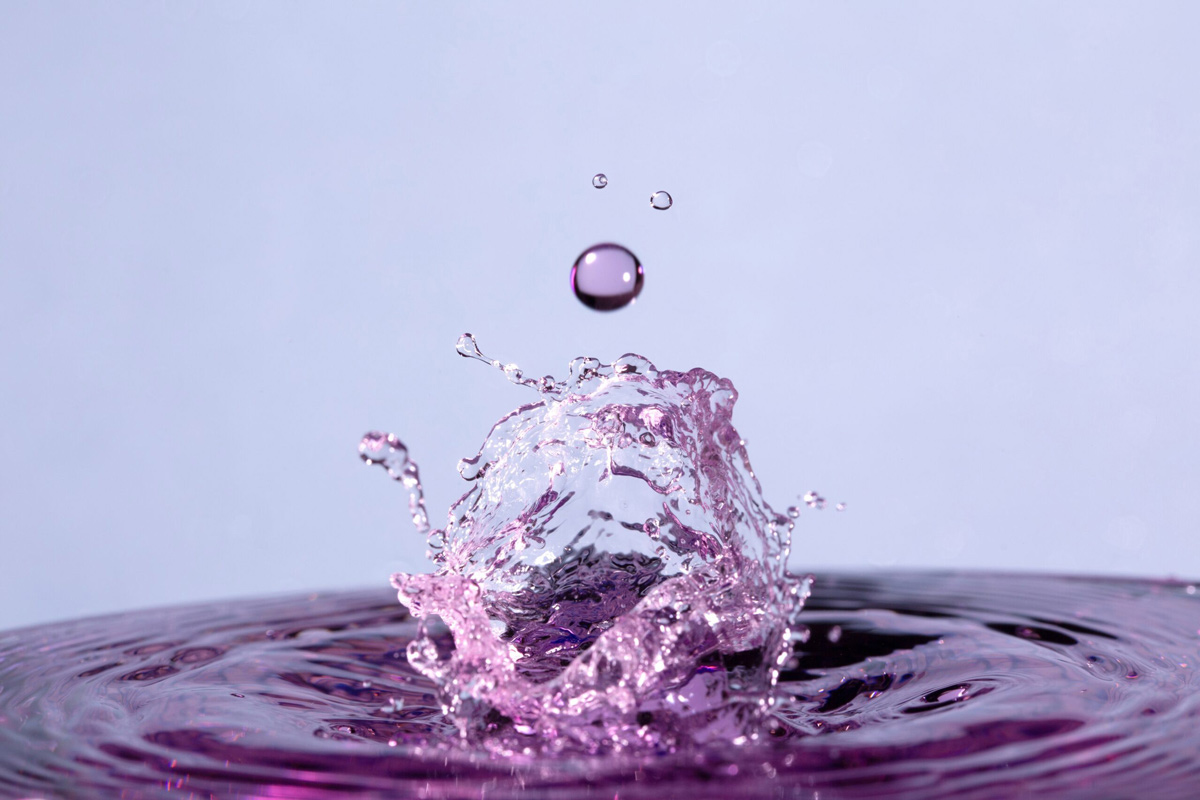 waves of change: Drop meets water surface